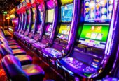Line of electronic slot machines in casino. Property released.